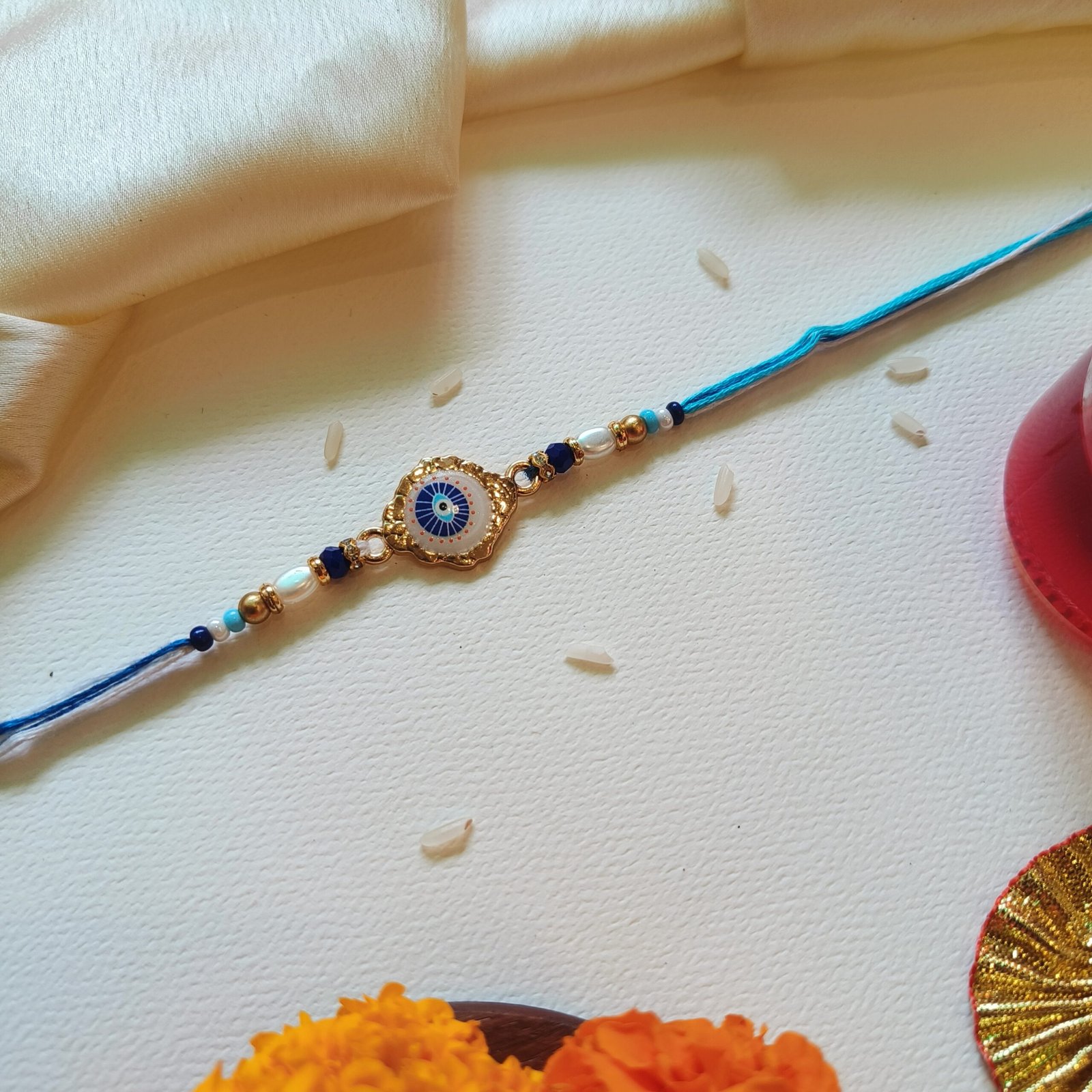 Nazar Raksha Rakhi – Intricate Blue Evil Eye
