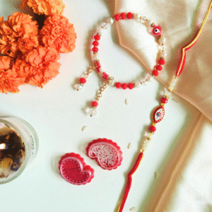 Crimson Charm – Evil Eye Rakhi & Bracelet Set