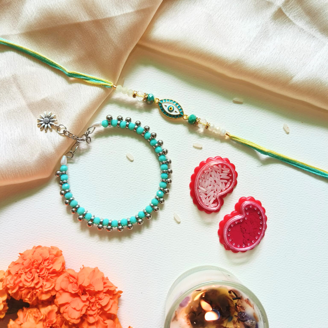 Aqua Nazar Rakhi & Charm Bracelet Set